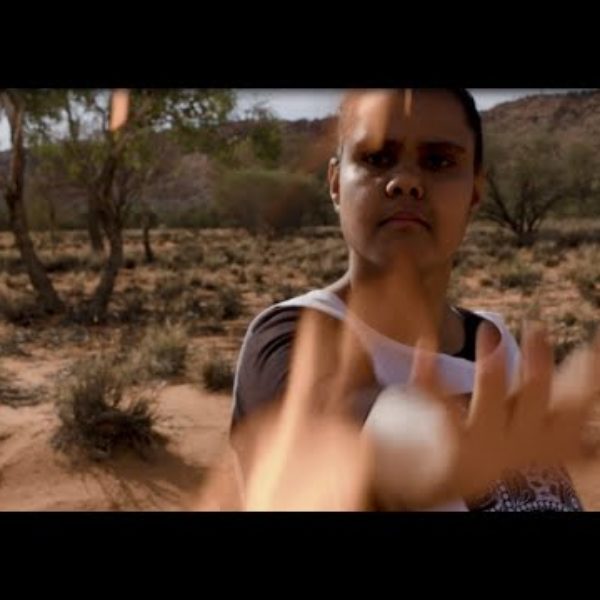 Young First Nations woman in the desert.