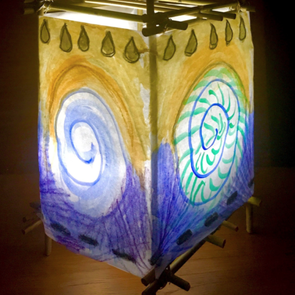 Painted lantern with light inside