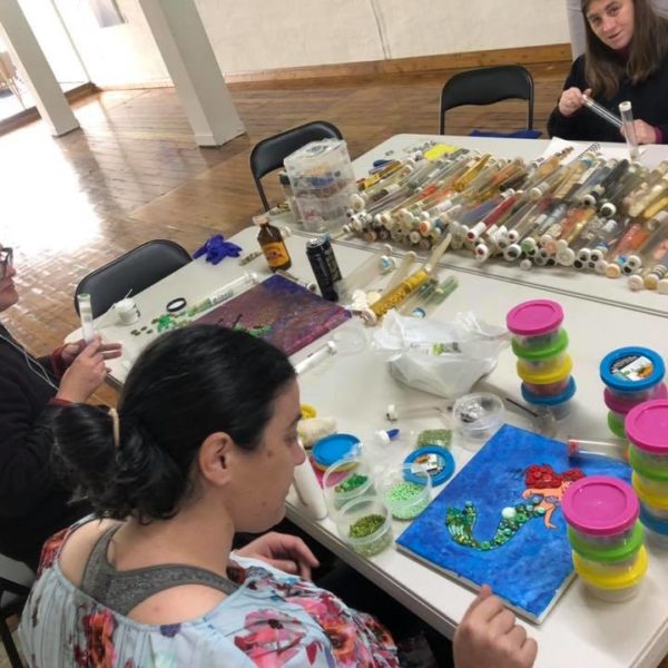 people working on art ptoject