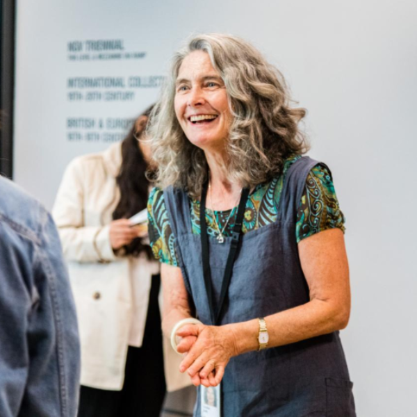 An NGV Guide delivering a program