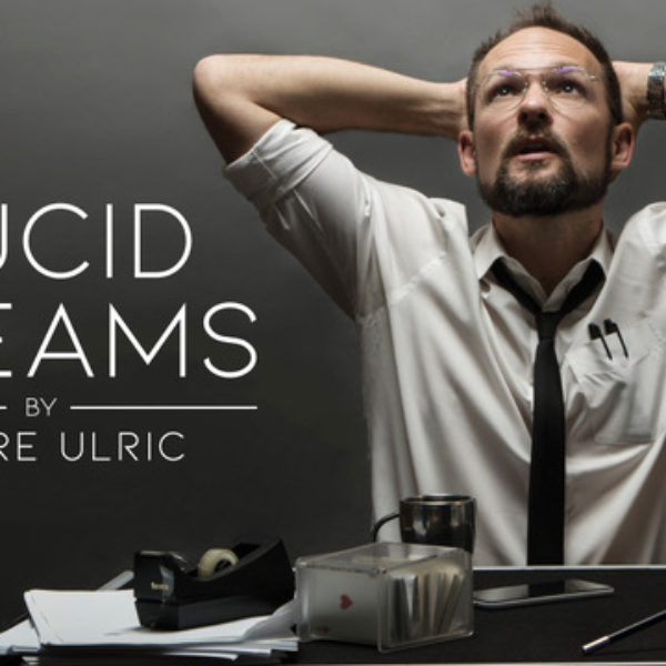 Lucid Dreams by Pierre Ulric.  Man at desk. 