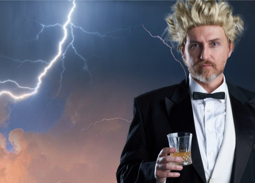 A man wearing a tuxedo stands holding a glass, with a stormy sky and lightning behind him. 