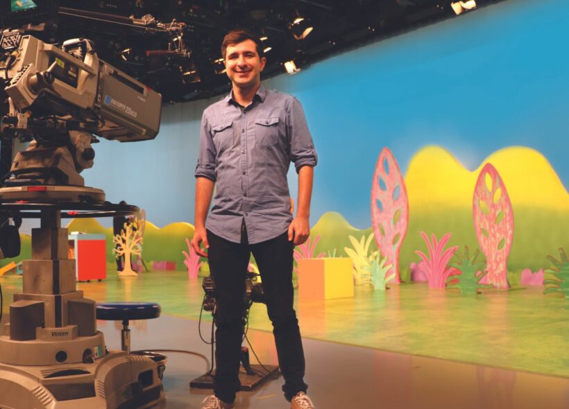 2018 Createability intern Joel Pragnell stands on the colourful set of ABC’s Play School. Image courtesy of Joel Pragnell.