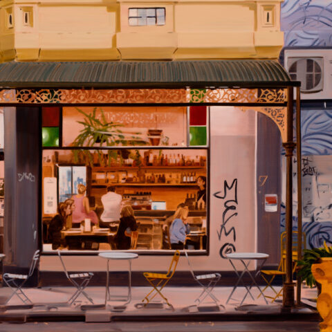A hyper-realistic oil and acrylic painting of a street corner in the evening. There is a restaurant on the corner with large windows, and there are people eating dinner and drinking inside. There are several small tables and chairs on the footpath outside, which are placed under an elaborate awning.