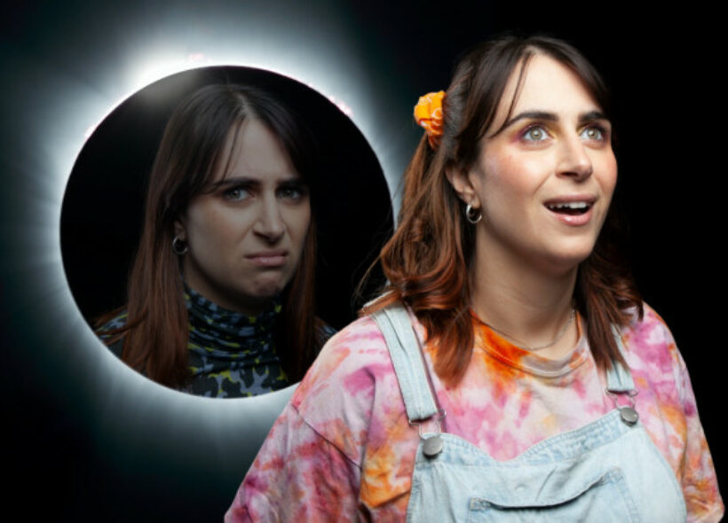 Ashley Apap looking off into the distance dressed in a tie-dye shirt and light blue overalls in front of an image of herself pulling a cranky face inside of an eclipse. 