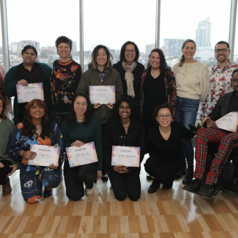  group photo from the 2022 Disability and Culturally Diverse Internship Graduation Ceremony, featuring graduating interns, staff from Accessible Arts and Diversity Arts Australia and the ceremony keynote speaker. Photo by Dieter Knierim.