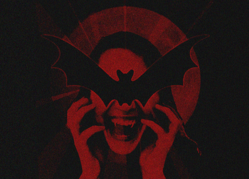 Red and black graphic of vampire with eyes covered by a black bat.