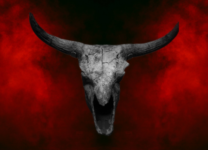 A red smokey background with a bulls skull overlay. 