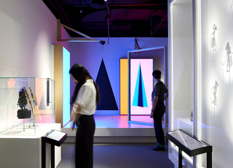 Two visitors standing in The Story of the Moving Image, ACMI's permanent exhibition