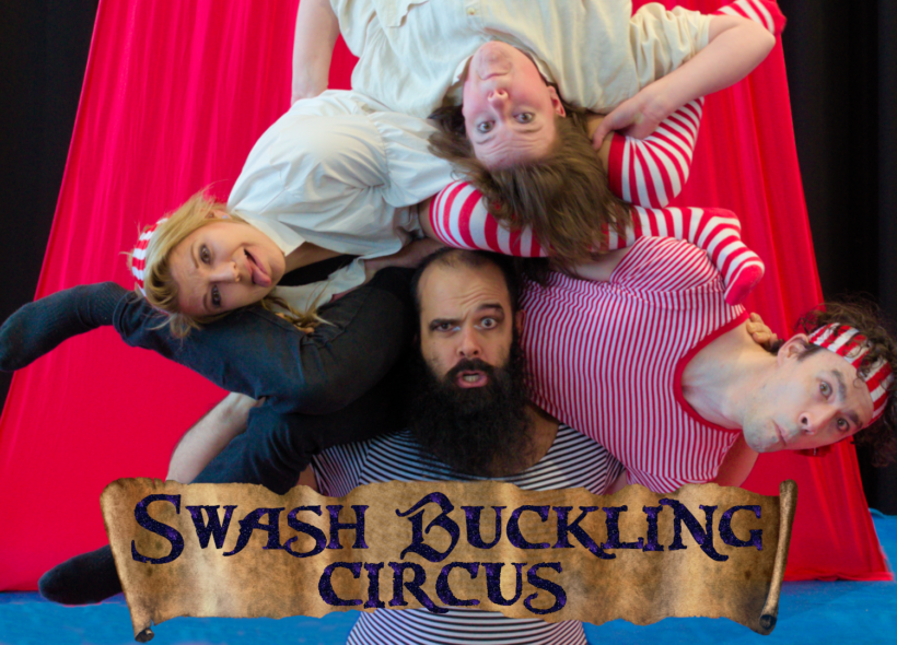 3 acrobats are stacked on top of a fourth, they are all looking at the camera, pulling funny faces. there is a red background with black edges, there is a scroll with the show name swashbuckling circus under their faces