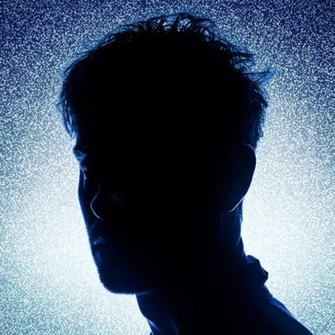 silhouette of man in front of gradient background