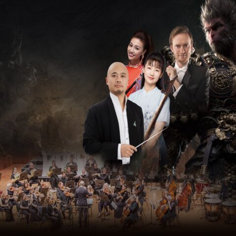 orchestra behind multiple floating bodies in top right of image