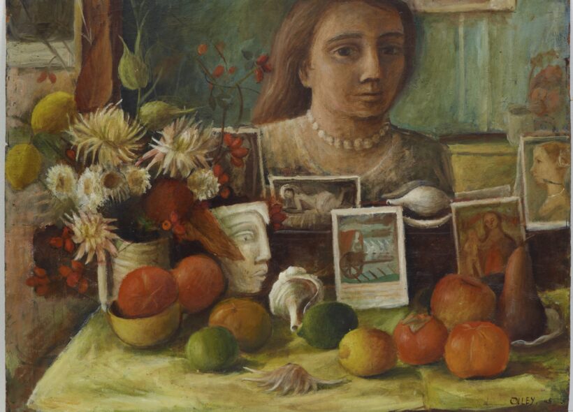 Still life painting featuring a table with fruits and flowers. Behind, a woman's portrait and various artworks. Warm, nostalgic tone.