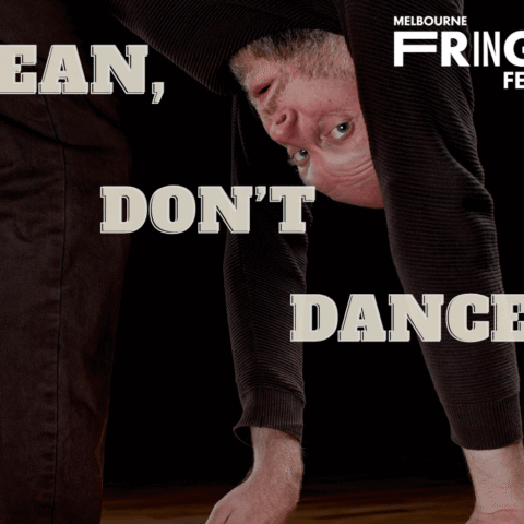 Dean Nash bends forward and looks through his legs against a black background, with text reading “Dean, Don’t Dance!” and the Melbourne Fringe Festival logo.